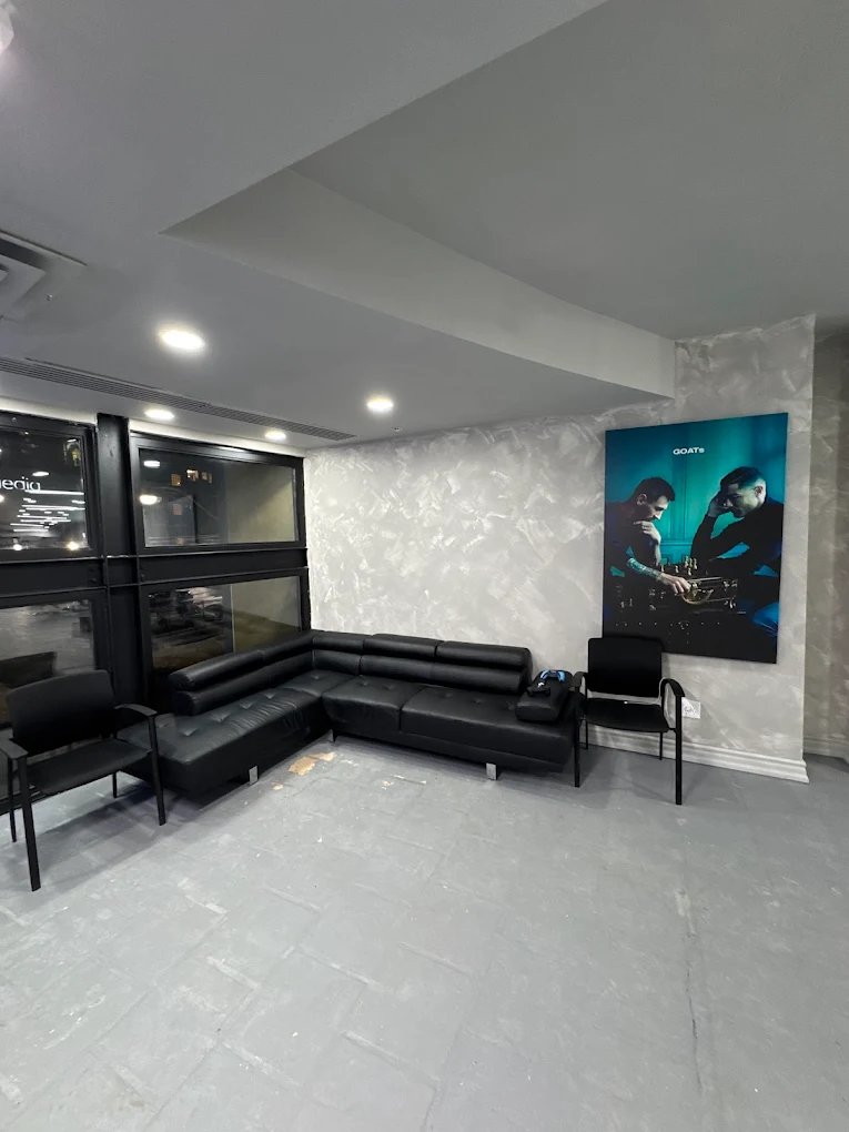 Comfortable waiting lounge with GOATs artwork